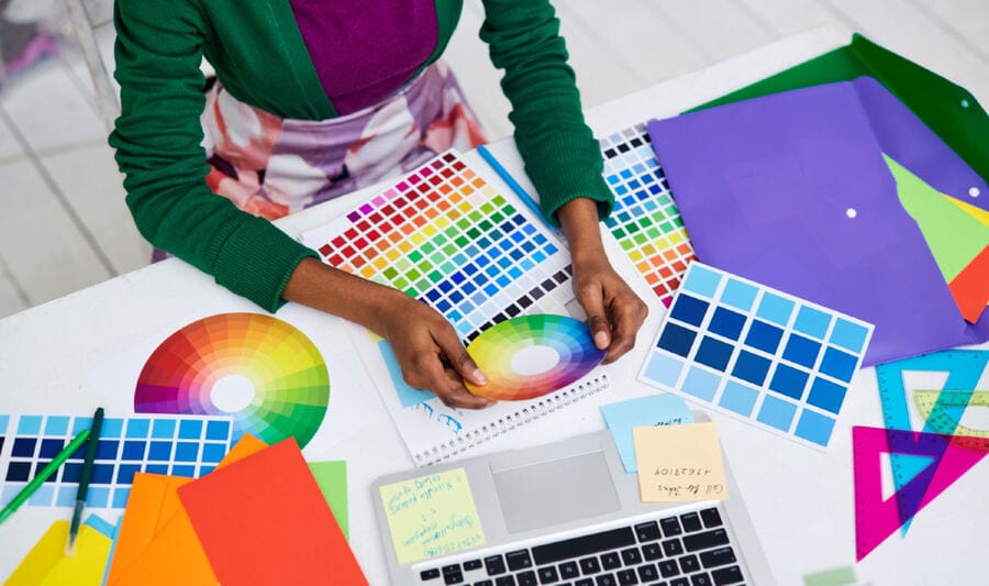 Web Design Colors 2025 Trends Shaping the Digital Aesthetic 5 Woman selecting a color palette